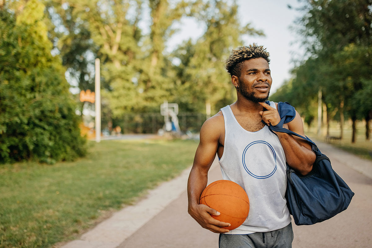 Student athlete on the way to play basketball